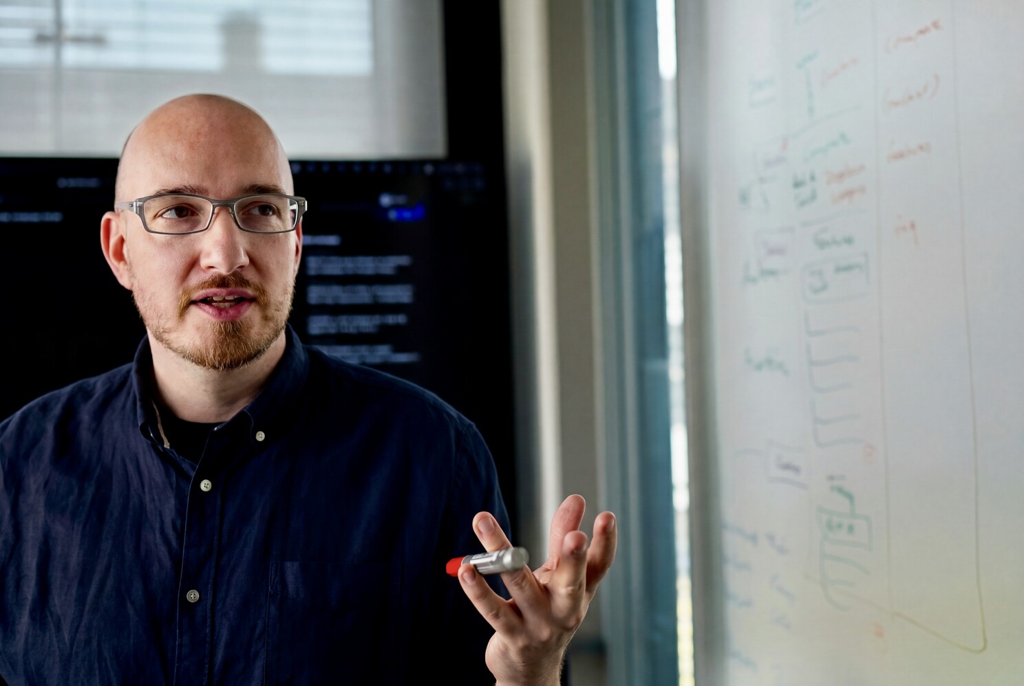 Martin Storbeck in front of whiteboard